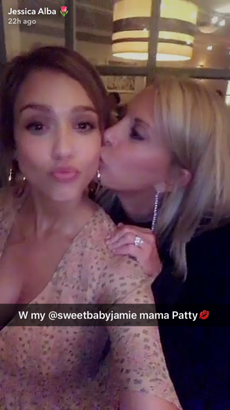 Jessica Alba shares a Snapchat while out to dinner in The Hamptons on August 5, 2017. She is wearing a The Great. The Manor Silk Gown, which features a clover floral print and flutter sleeves.